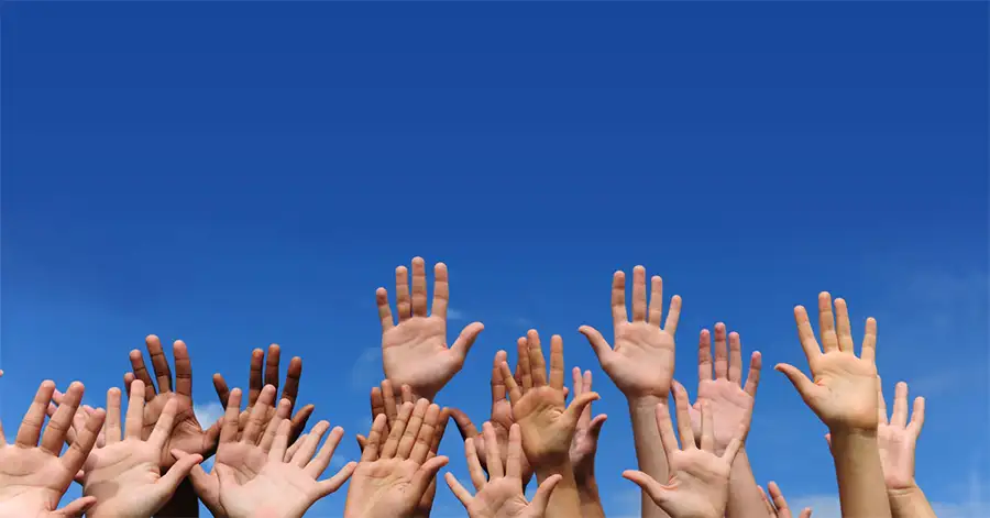 Participants raising their hands
